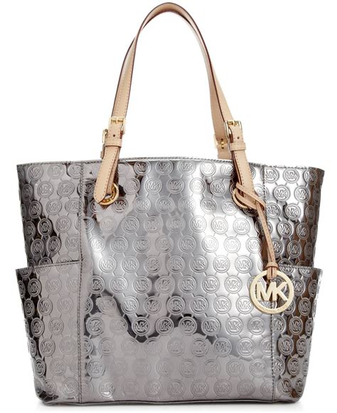 white and silver michael kors purse|michael kors gold purse large.